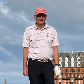 Roger Hemister in St Andrews on the renowned Swilican bridge posing for a photo 