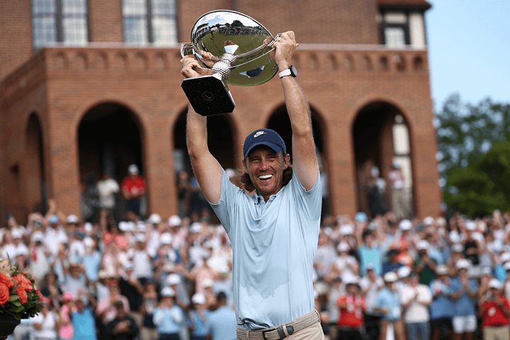 Tommy Fleetwood lifting the Tour Championships trophy at East Lake Golf Club in Atlanta