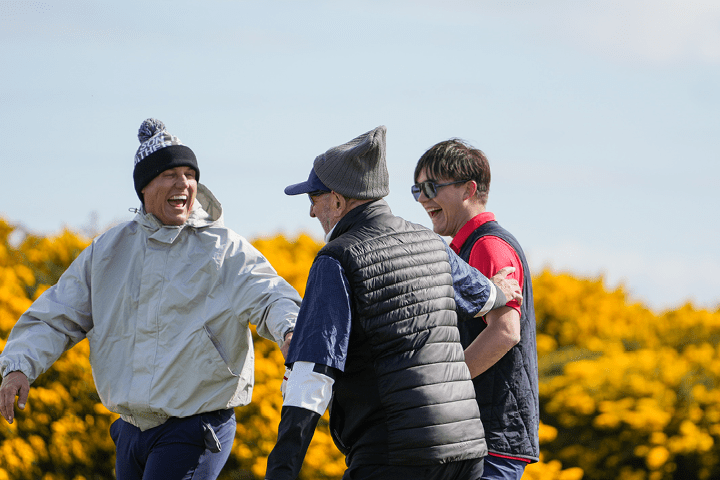 Father and Son group enjoying themselves at Kingsbarns in St Andrews, Scotland