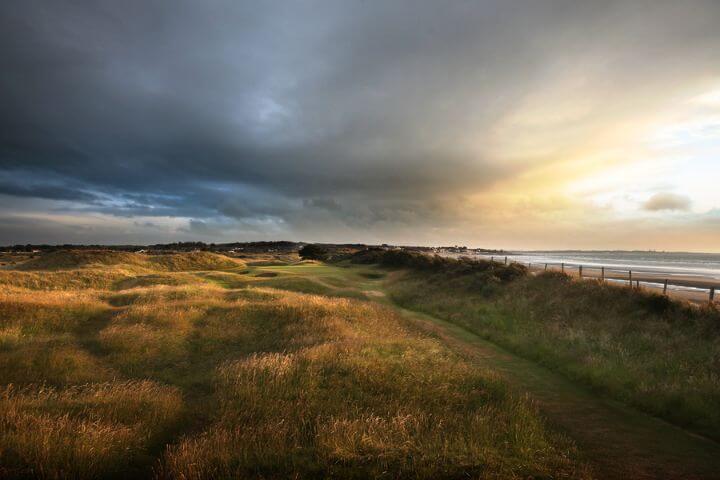 Moody clouds loom over the Portmarnock Links golf course, Ireland