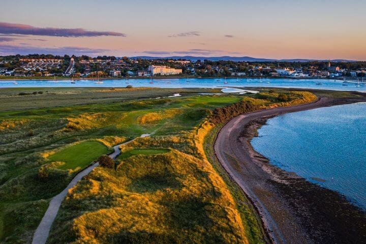 Sun setting over The Island golf course, Ireland
