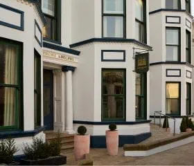 Main entrance of the Portrush Adelphi Hotel in northern ireland.