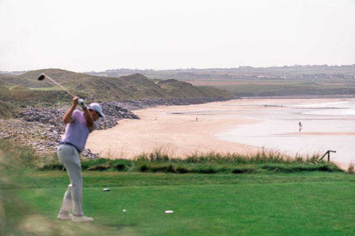Teeing off on the 14th hole of Ballybunion, Ireland.