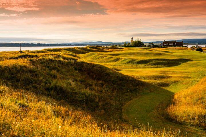 Sun set over the Fortrose and Rosemarkie golf course in Scotland from the sea