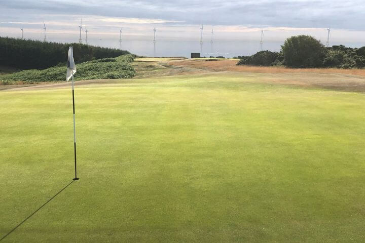 The green overlooking the sea at Murcar Links golf course in Scotland