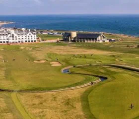 View of the river flowing through the golf course and views towards the sea at the Carnoustie Golf Course in St Andrews in Scotland