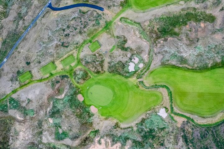 Birds eye view from footage using a drone of the golf course at the Dumbarnie Links in St Andrews in Scotland
