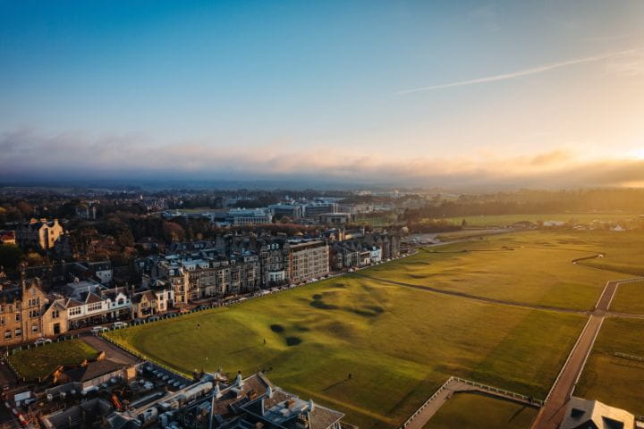 The sun starts to set on the beautifully iconic Old Course, St Andrews