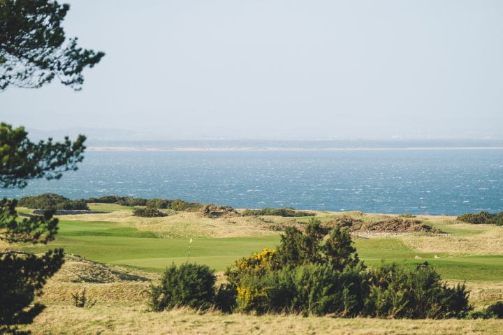 Torrance Course greens and fairways looking over the sea.