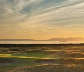 Sunset over the course at Prestwick golf course in Scotland