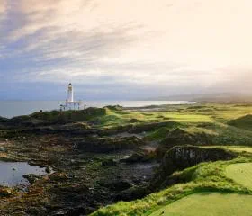 View of the course from the sea at The Ailsa golf course in Scotland