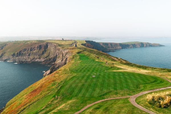 Old Head Course with golfers enjoying a round in August, Ireland.