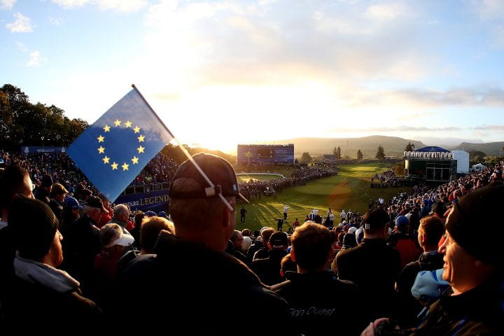 Fans waving the European flag at the 2025 Ryder Cup in New York.