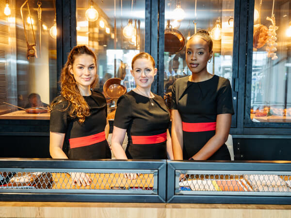 Service staff at the welcome desk in The Gate